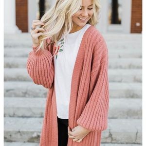 Long, pink cardigan with bell sleeves